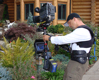 Rob Van Camp filming on top of a train at the Durango and Silverton Railway.